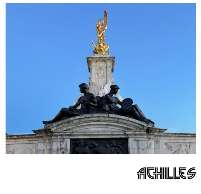 VALERIE mood: tiered monument with a golden winged statue against a blue sky